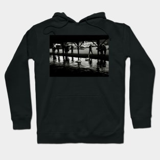 People shelter from the rain in Wroxham, Norfolk, UK Hoodie